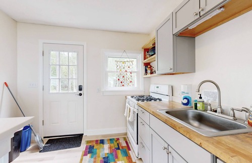 Sebasco House | Water view home with scenic balcony, grill, board games, and AC