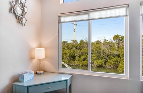 Lower Matecumbe Beach House | Water-view house with private dock, washer/dryer & grill - snowbird-friendly