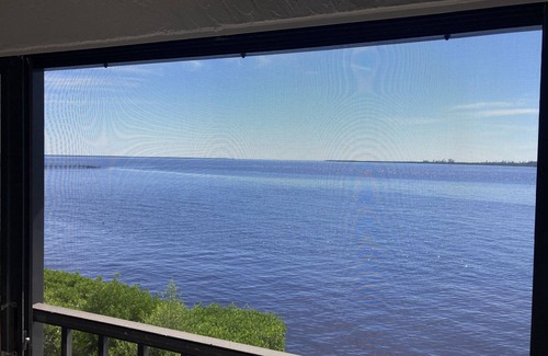 Port Charlotte Condo | Water view of Charlotte Harbor. 2 bed 2 bath walk up condo totally refurbished