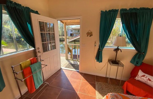 Avalon Beach Cottage | Waterfront 1 bedroom cottage in charming Milton/Pensacola with WiFi, AC