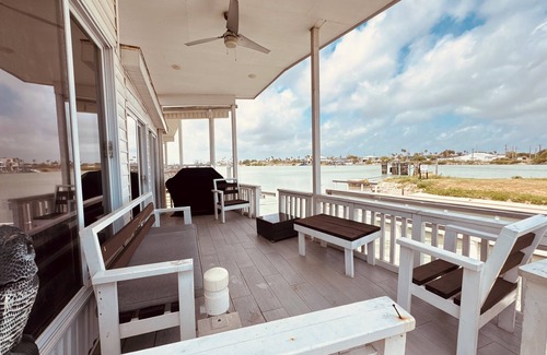 Port Isabel Cottage | Waterfront 1BR 2 bed in Long Island Village; Watch for Dolphin from the deck!