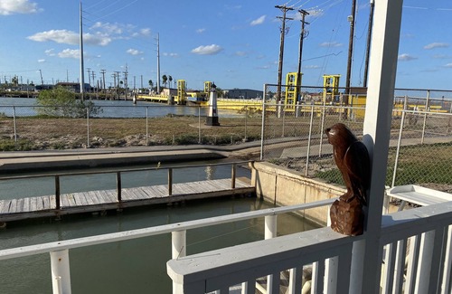 Port Isabel Cottage | Waterfront 1BR 2 bed in Long Island Village; Watch for Dolphin from the deck!
