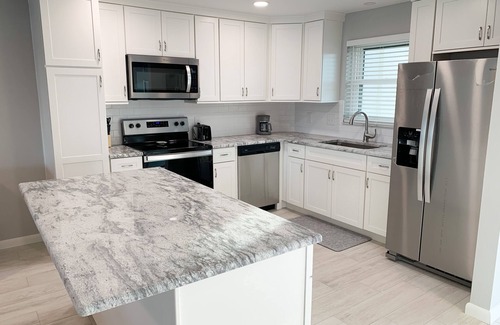 Treasure Island Condo | Waterfront 2B/2B, Pool, Steps to Sand, Remodeled