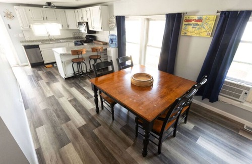 Spring Grove Cottage | Waterfront 2BR Nautical Cottage on Grass Lake - Hot Tub, Firepit & Year-Round Fun