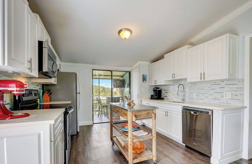New Smyrna Beach Condo | Waterfront 2BR/1BA Fully Furnished Condo in New Smyrna Beach w Private Boat Slip