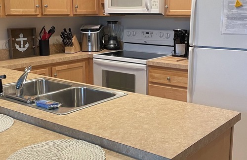 Alexandria Bay Condo | Waterfront 3 BDRM/2 BA condo with boathouse