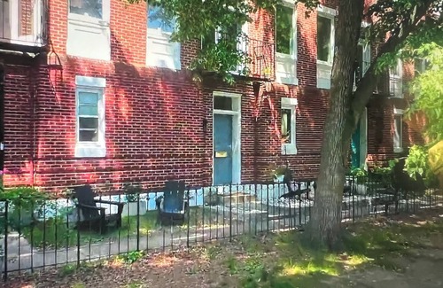 Canton House | Waterfront area with gated front yard gated parking