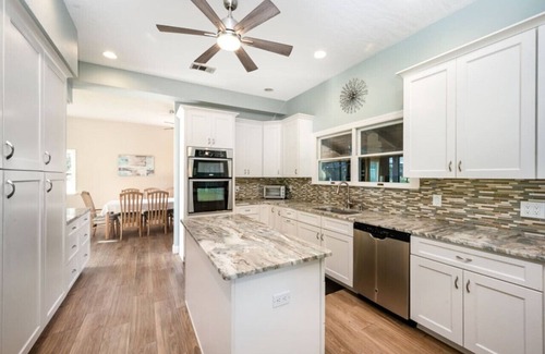 Tropic House | Waterfront Beauty: Sleeps 15, Heated Pool, Private Dock, Near Beach