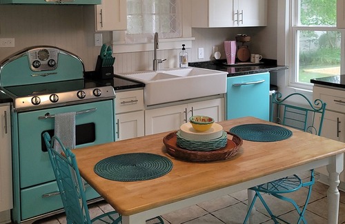Colonial Beach House | Waterfront Coastal Farmhouse, Private Pier, Fire Pit with Separate Bunk House