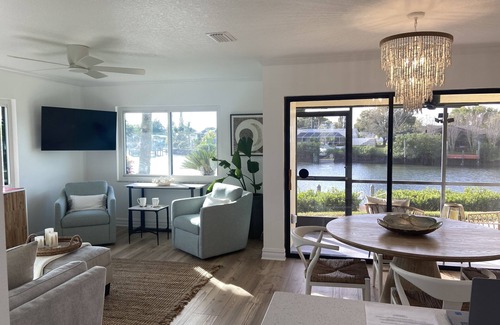 Apollo Beach Condo | Waterfront condo, gated, dock, lanai, newly remodeled, single story.