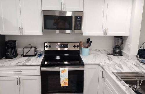 Tierra Verde Condo | Waterfront condo newly remodeled and furnished. Community pool and tennis court.
