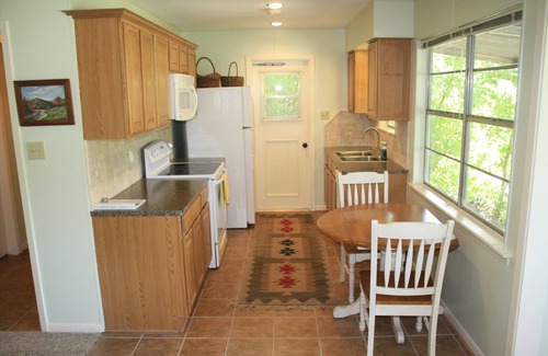 North Shore Colony Cottage | Waterfront Hatter Cove Cottage with Private Boat Dock