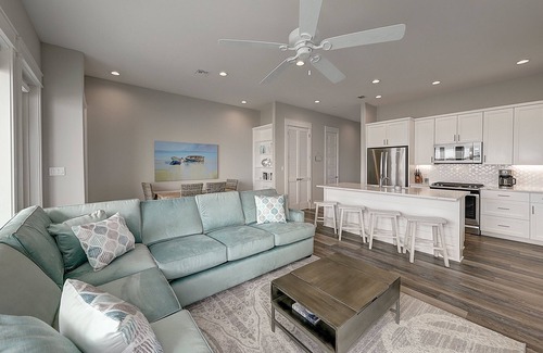 Rockport House | Waterfront haven with Bay views, patio, luxe suites, and shared dock and pool