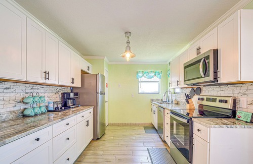 Spring Hill Cottage | Waterfront Hernando Beach Home w/Dock & Hot Tub!