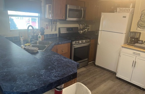 Satsuma House | Waterfront home in Satsuma. Two bedrooms each with full bath. Gas grill.