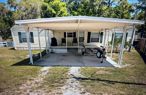 Satsuma House | Waterfront home in Satsuma. Two bedrooms each with full bath. Gas grill.