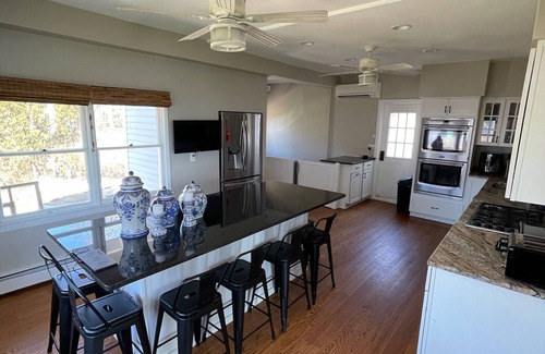 Branford House | Waterfront home- Sleeps 10 - private beach-epic pool