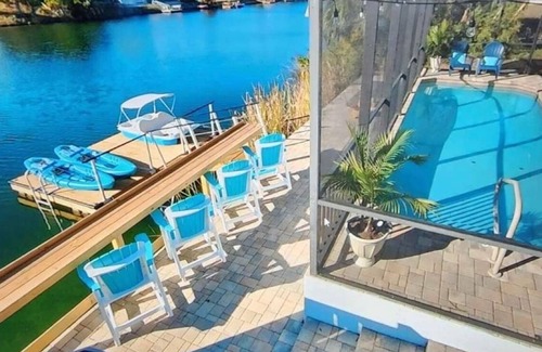 Spring Hill House | Waterfront Home - GameRoom/Saltwater Pool/Tropical Sunsets/Fish/Swim