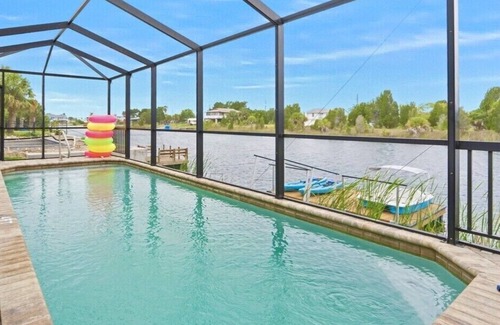 Spring Hill House | Waterfront Home - GameRoom/Saltwater Pool/Tropical Sunsets/Fish/Swim