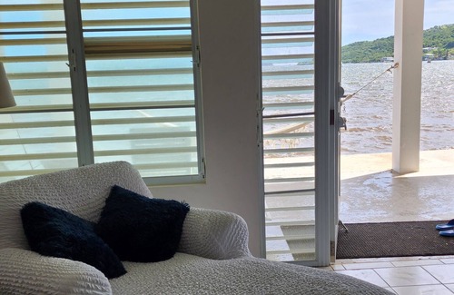 Culebra Pueblo House | Waterfront home with panoramic views of Ensenada Honda "the deep cove"