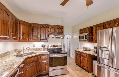 Annapolis House | Waterfront home with scenic porches, yard, grill, jetted tub, central AC, & W/D