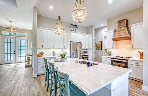 Port Charlotte House | Waterfront Key West Style Home with Heated Pool Located in South Gulf Cove