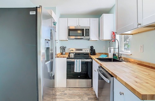 Spring Hill House | Waterfront Luxury Private Beach Heated Pool Dock Kayaks