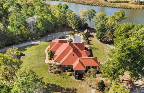 Pinecrest House | Waterfront Mansion w/Saltwater Pool, Dock, Game room, Tiki Bar, Kayaks + More