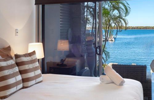 Runaway Bay Apartment | Waterfront Oasis in Runaway Bay - CoastHM