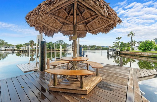 Harbor Hills House | Waterfront Oasis w/Pool, Spa, Boat & Jet ski Dock, Game Room & Outdoor Kitchen