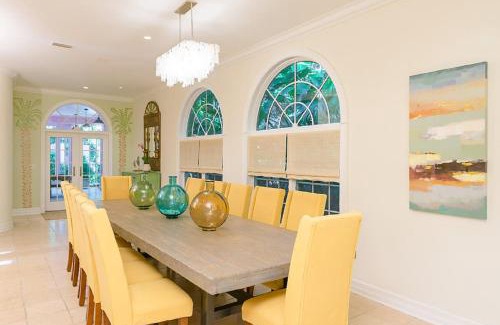 Captiva House | Waterfront Pink House with Private Dock & Pool