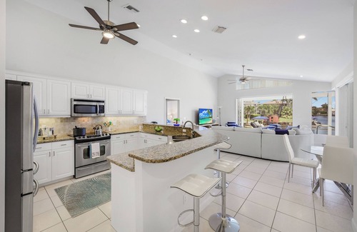 Marco Island House | Waterfront pool home just steps to Tigertail Beach