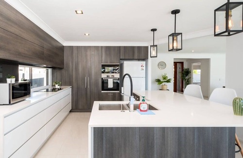 Runaway Bay House | Waterfront Resort-Style Retreat - Runaway Bay