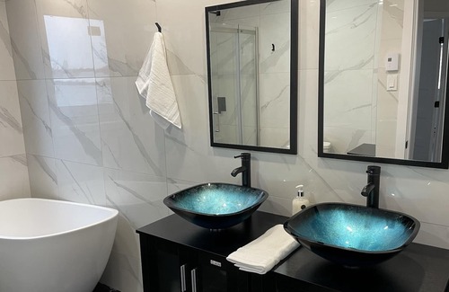 Laval Apartment | Waterfront unit with outdoor hot tub