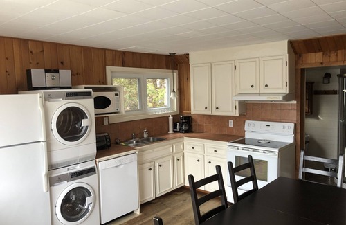 Austin Ski Chalet | Waterfront with amazing terrasse on Orford lake with inground salt spa and sauna