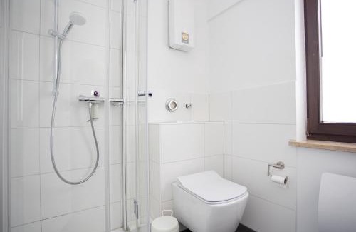 Zueschen Apartment | Welcome in - Huisdiervriendelijk appartement met zonnig terras