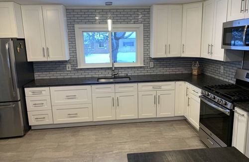 Indian River House | Welcome to Maison Bleu…just 200 steps away from the waters edge of Burt Lake!