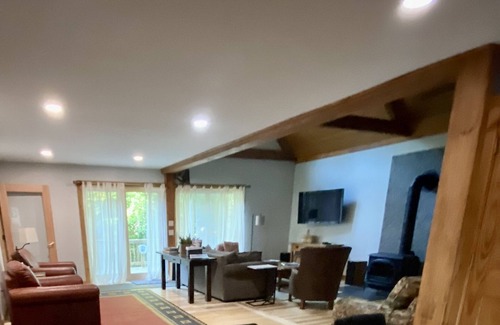 Saranac Lake House | Welcome to our recently expanded and renovated year round Adirondack Chalet.