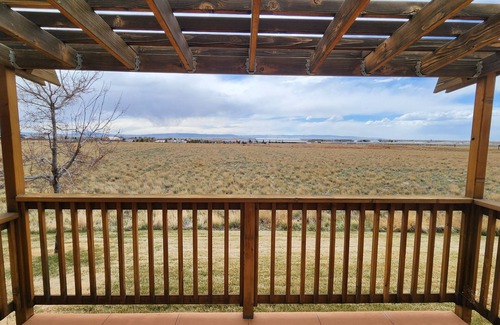 Laramie House | Welcoming home on the outskirts of town, quiet neghborhood, beautiful views.
