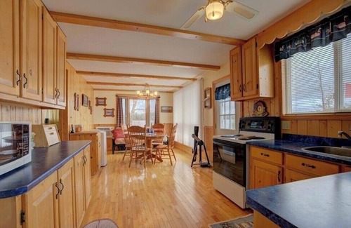 North Frontenac Cottage | Well equipped bright family cottage . Amazing swimming, fishing and boating.