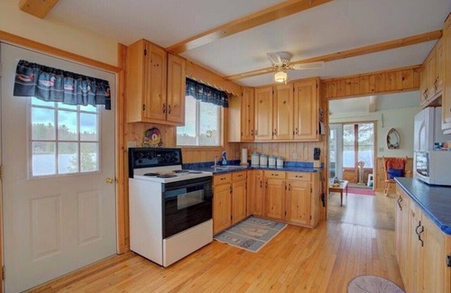 North Frontenac Cottage | Well equipped bright family cottage . Amazing swimming, fishing and boating.