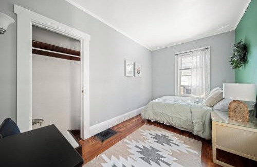 Oak Square Apartment | Well-Lit Bedroom near Transit and Charles River