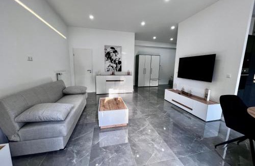 Loehne Apartment | Werre Apartments mit Smart-TV - stilvol, zentral & gemütlich