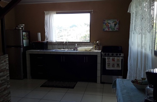 Grecia House | What A Retreat! In a pleasant neighborhood in the beautiful hills above Grecia.
