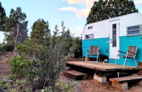 Monticello Apartment | While not a hotel, the Feather Trailer provides a relaxed, peaceful retreat in nature with the warmth and convenience you need for a memorable outdoor getaway.