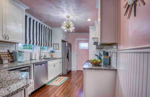 Bradenton House | Whimsical decor-pergola swings-moonlit hot tub-FUN
