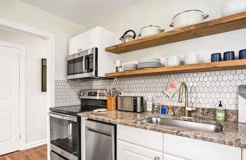 Oakford Park House | Whimsical Midtown home with covered porch, tennis & W/D - dog-friendly