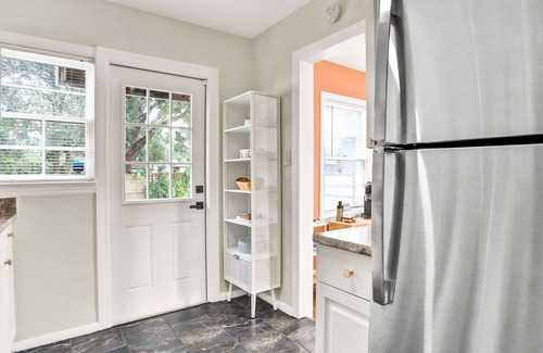 Oakford Park House | Whimsical Midtown home with covered porch, tennis & W/D - dog-friendly