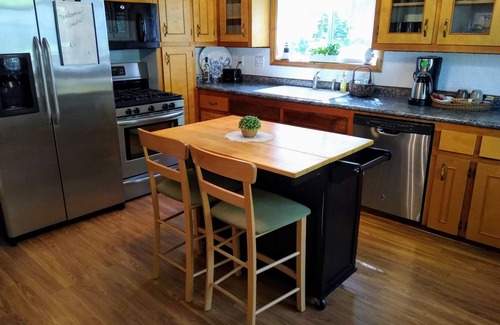 Caseville Cottage | 'Whispering Oaks' Cottage with Lake Access, Outdoor Fire Pit and More!