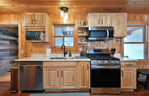 Spooner House | Whispering Woods- Spacious 5 bedroom home with sandy frontage near Spooner, WI.